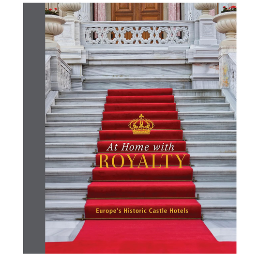 Book cover featuring a red carpet down castle stair case