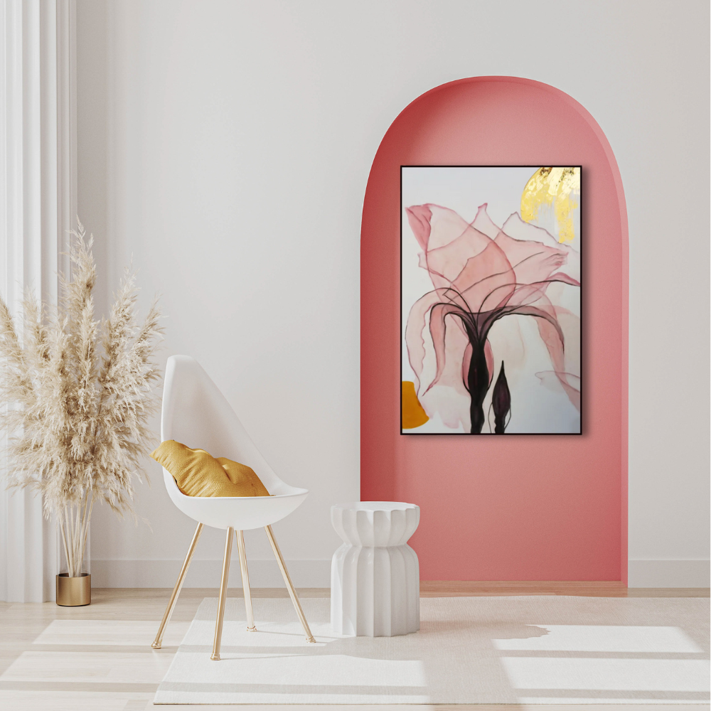 Floral image hanging in a pink alcove with white furniture and walls