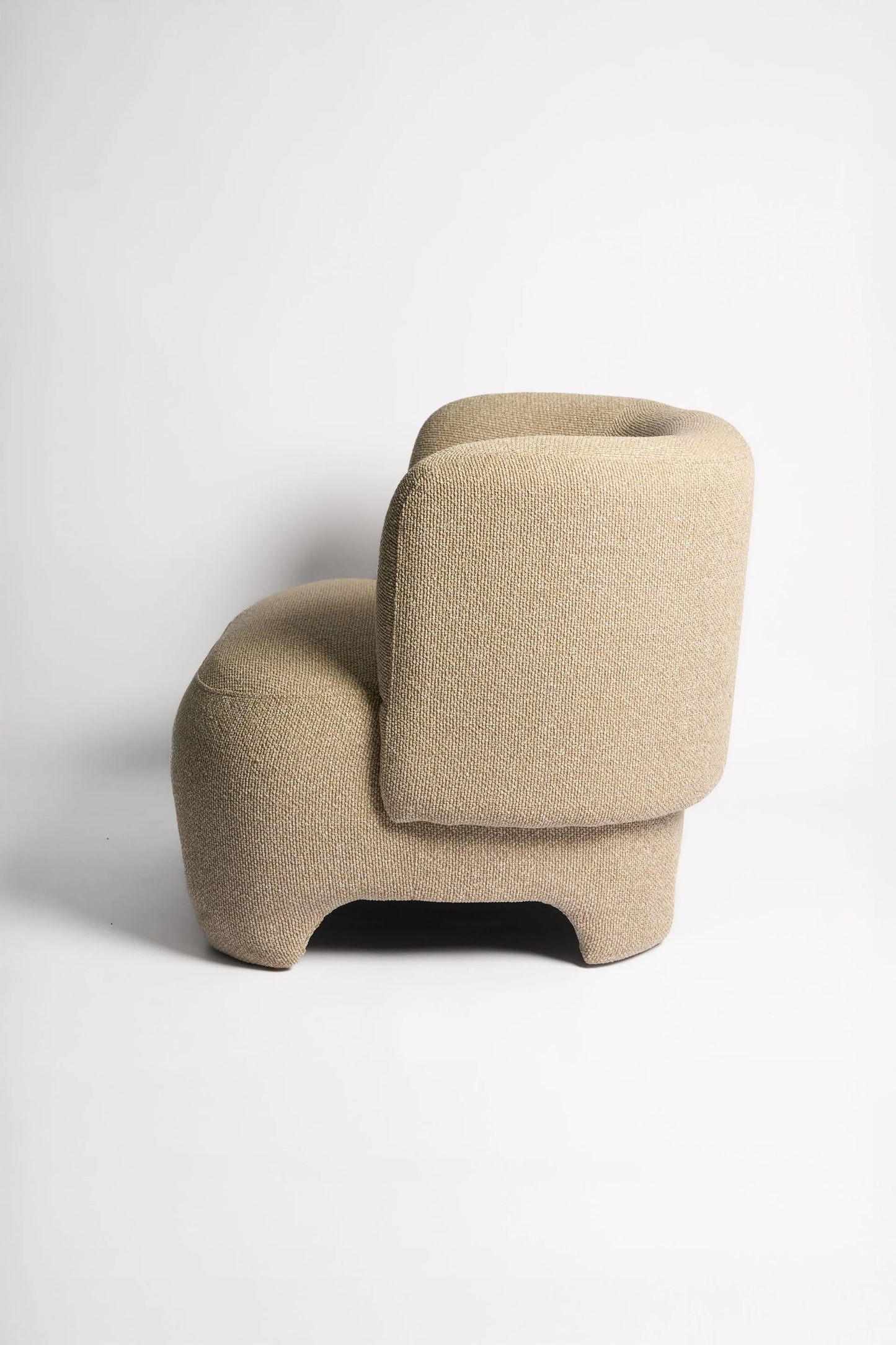 Beige armchair on a white background