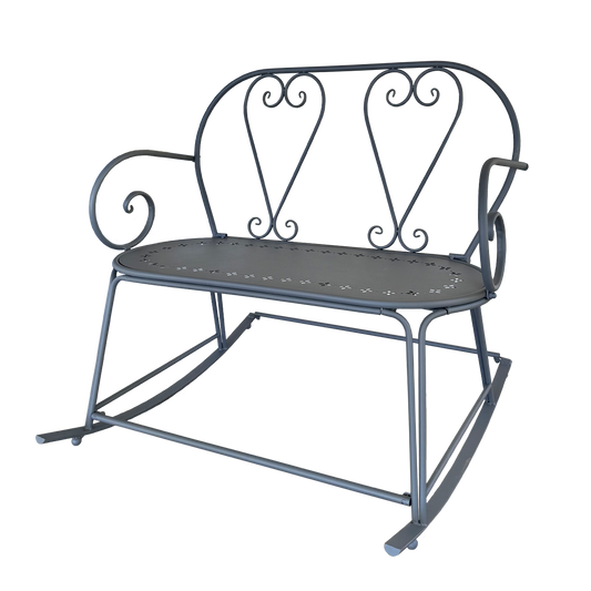 Decorative metal rocking chair with heart-shaped backrest on a white background