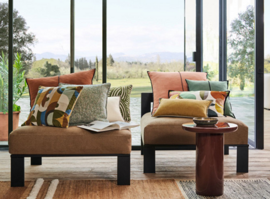 Lifestyle shot of Casamance cushions on chairs