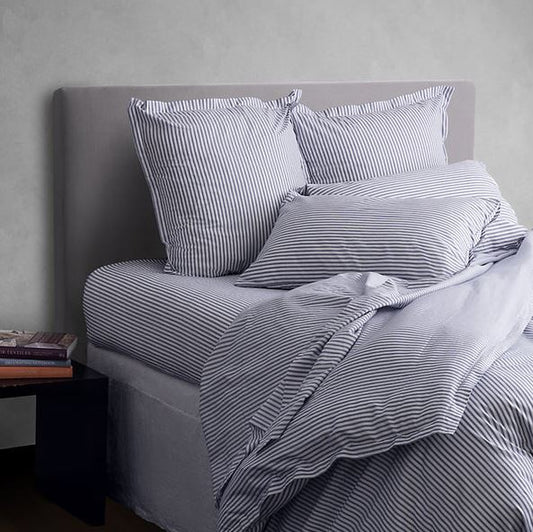 Blue and white ticking stripe duvet and bed linen on a great ged