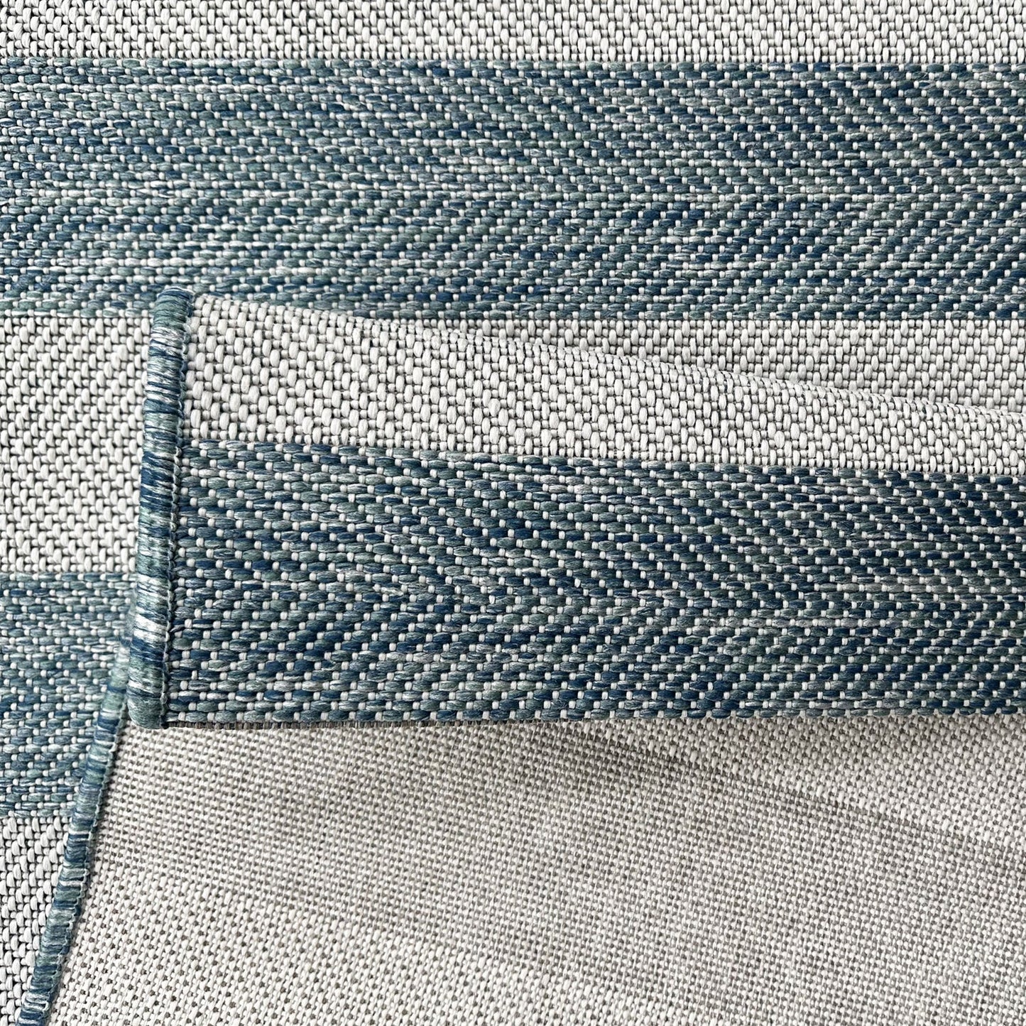 Close-up of blue and gray woven fabric