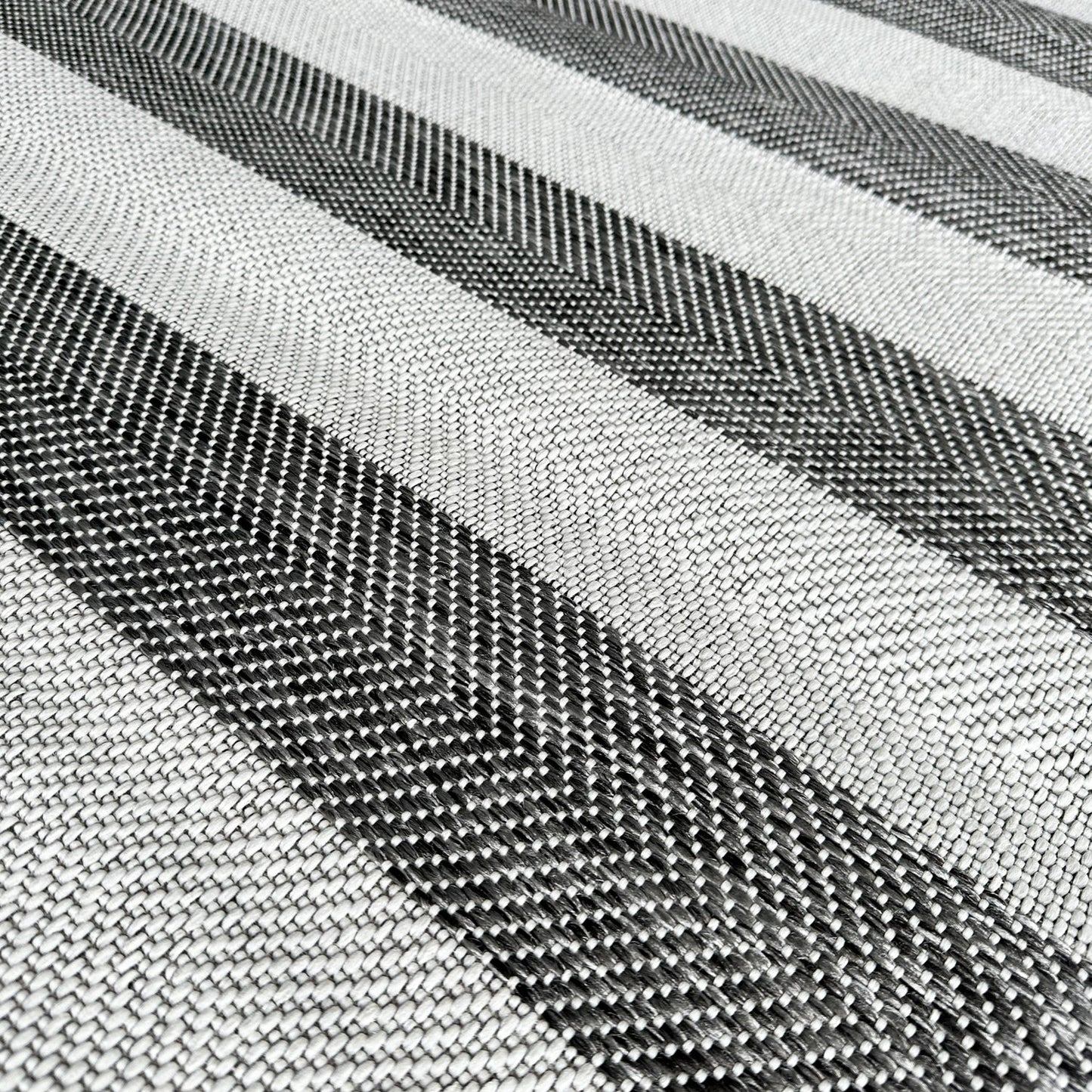Close-up of black and white striped fabric texture