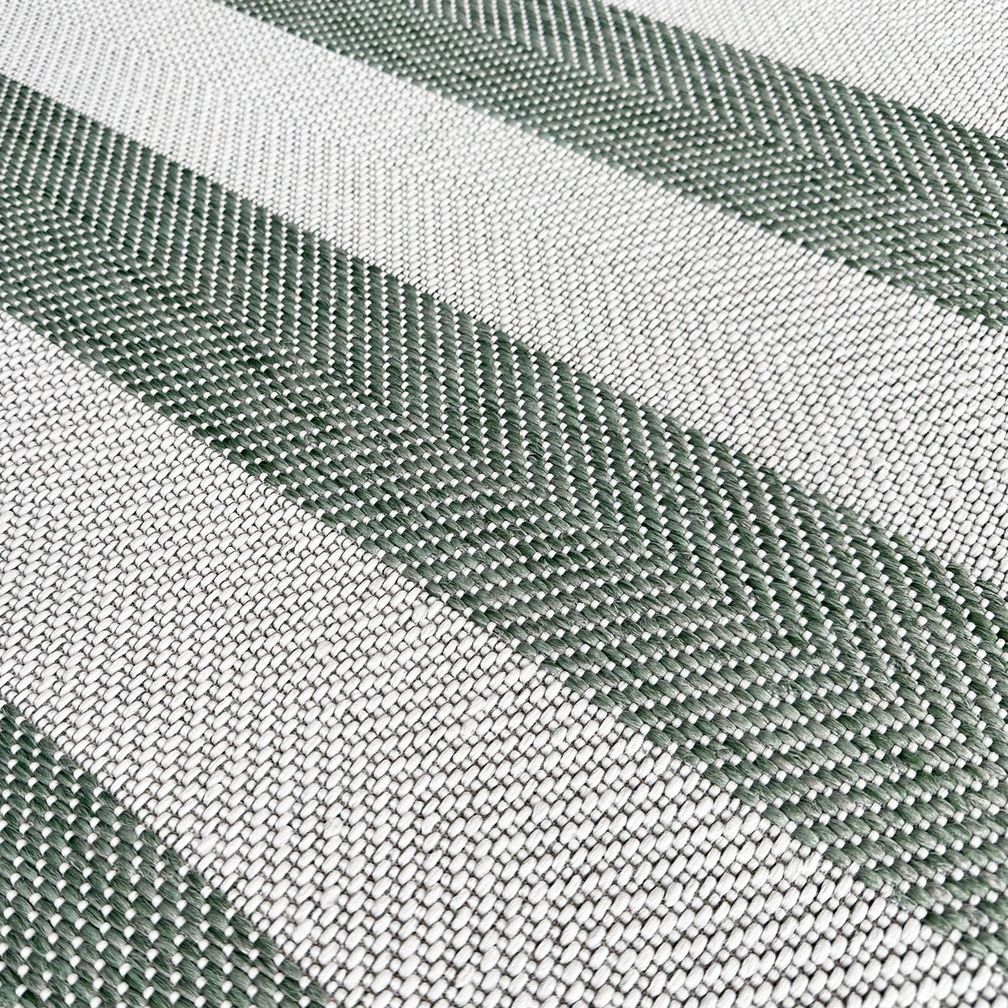 Close-up of green and white striped fabric texture