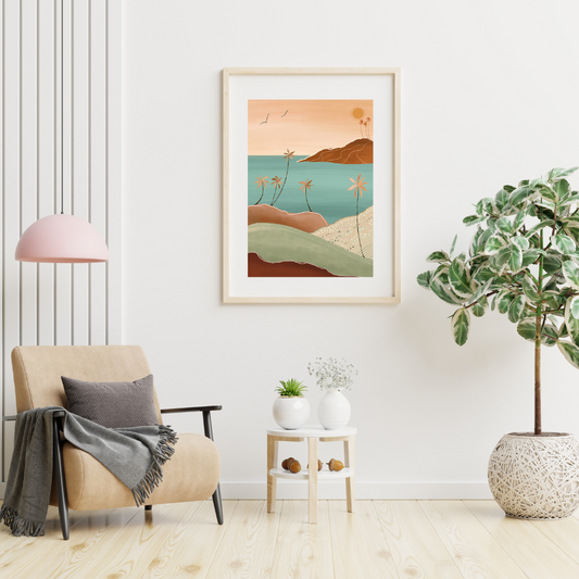 room setting with a pink ceiling lamp over hanging a tan chair with black wood arms and brown throw and cushion, on the wall is a tropical surreal scene of a beach in ochre, green, terracotta and sand in a wooden frame. There is also a small coffee table with two white pots with plants and a larger treen plant in a white pot