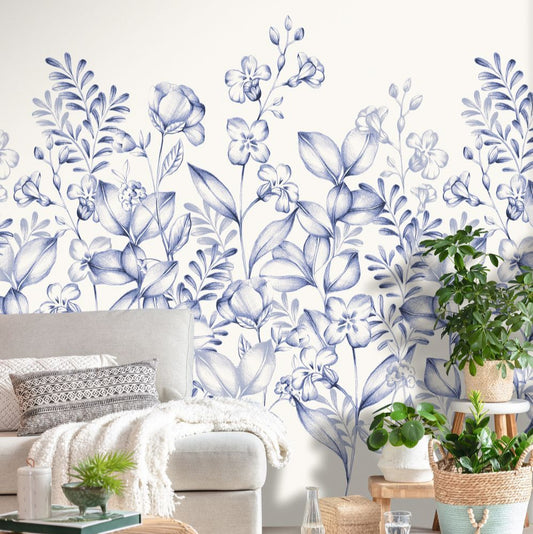 monochrome flowers and leaves rise from the ground upwards across the wallpaper