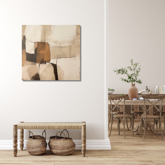 Abstract painting in warm neutral colours hanginge on blank wall with a rattan bench and baskets beneath