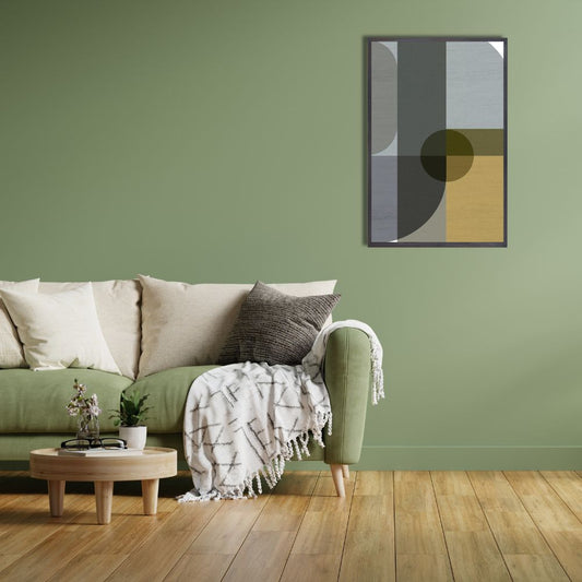 Geometric Shapes II art print on a green wall next to a green sofa with cushions and a wooden floor