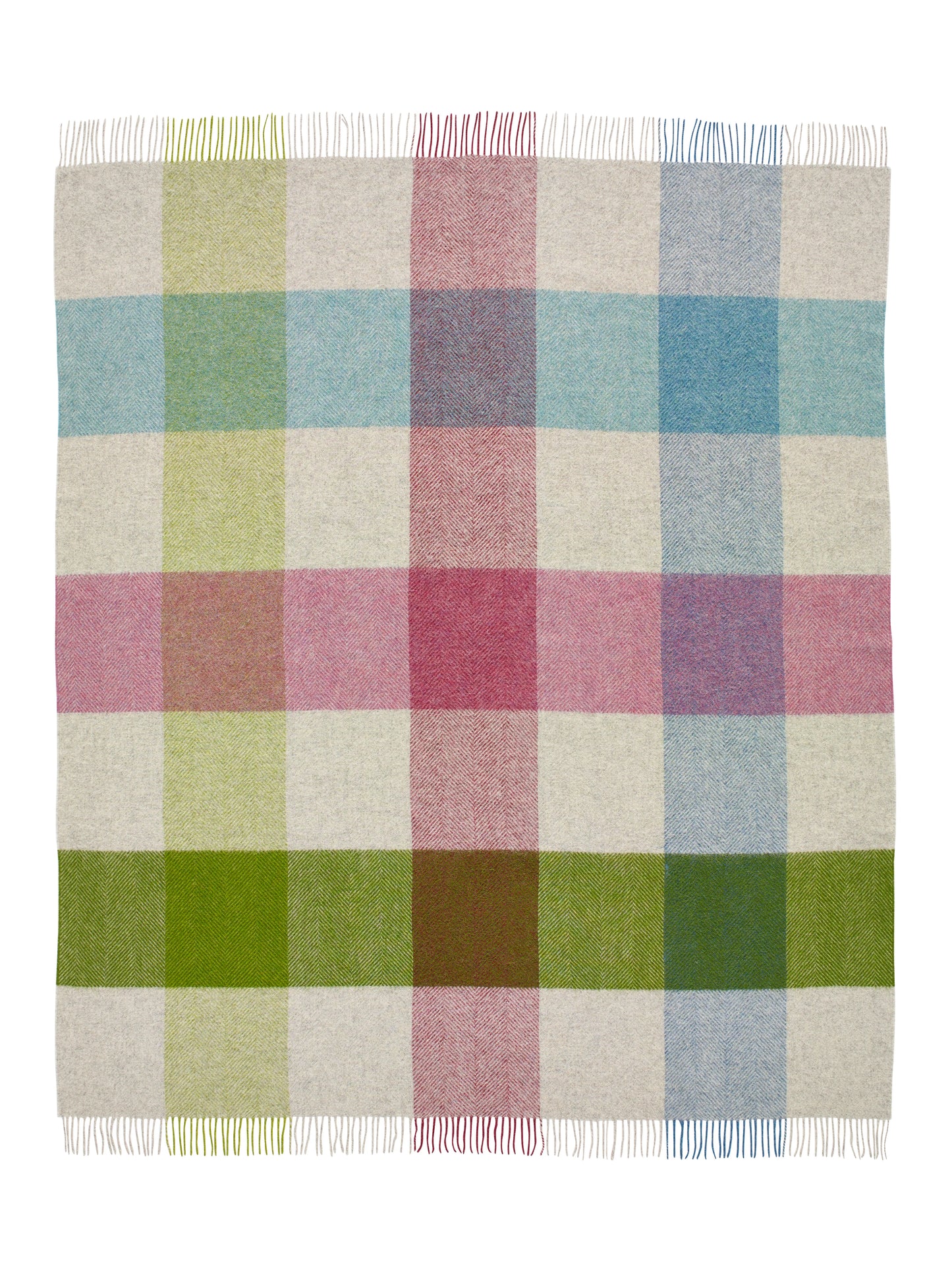 Multicolored checkered blanket with fringes on a white background