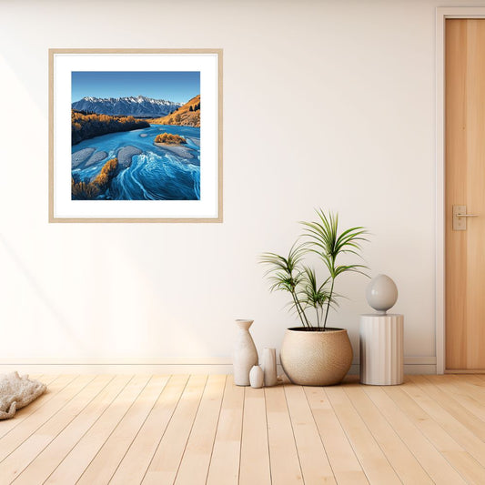 Framed art print of Kawarau River by Steve Ballantyne hanging on a wall with pots and vases in front