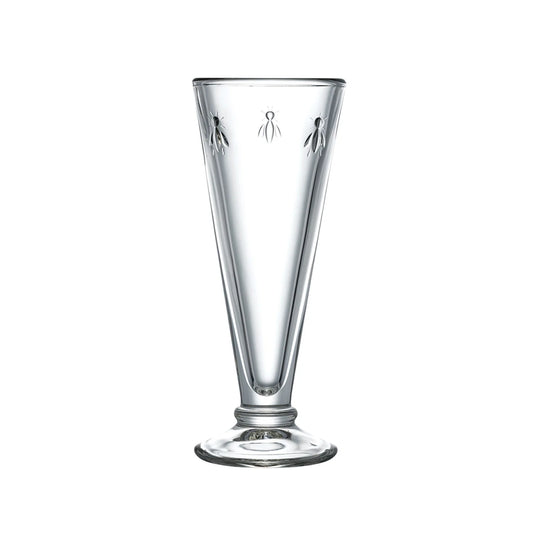Clear glass with engraved designs on a white background
