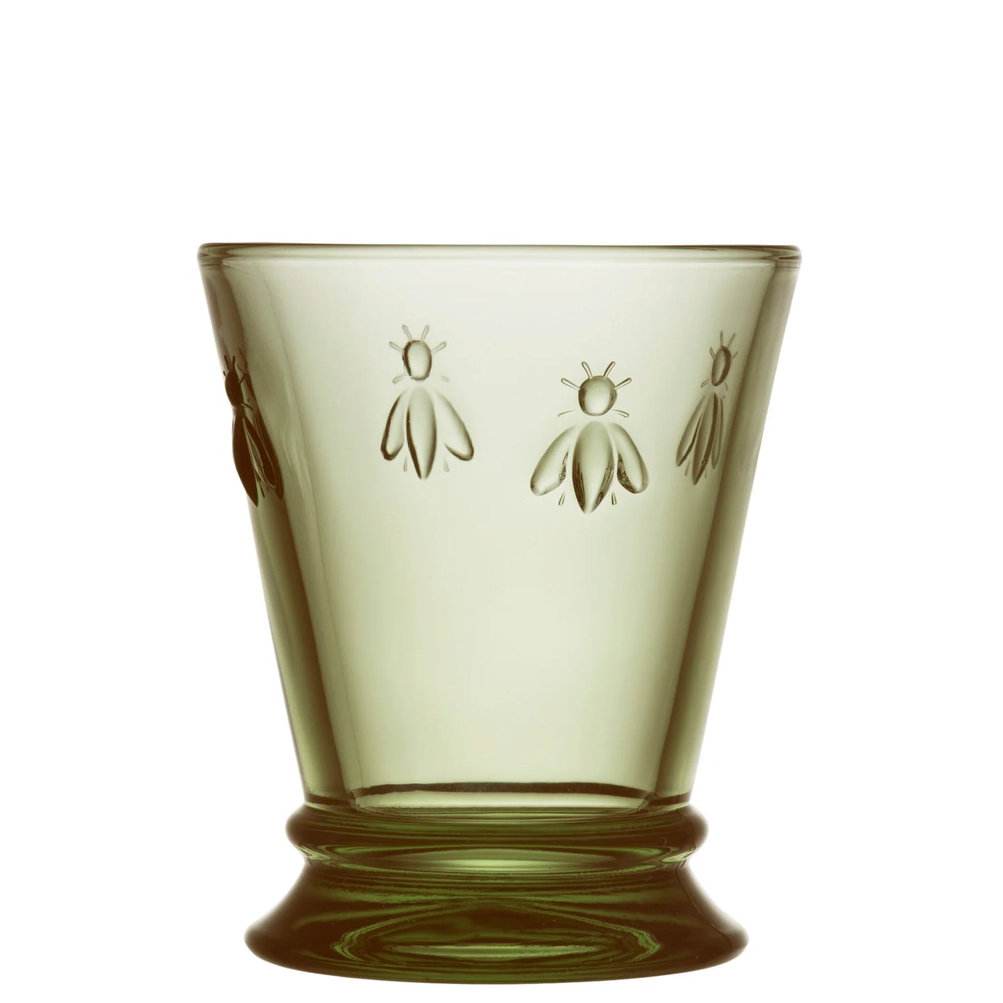 Green glass with bee designs on a white background