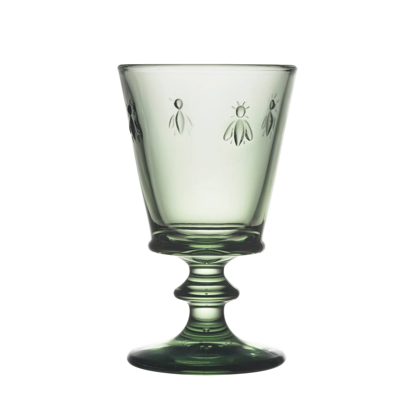 Green glass with bee designs on a white background