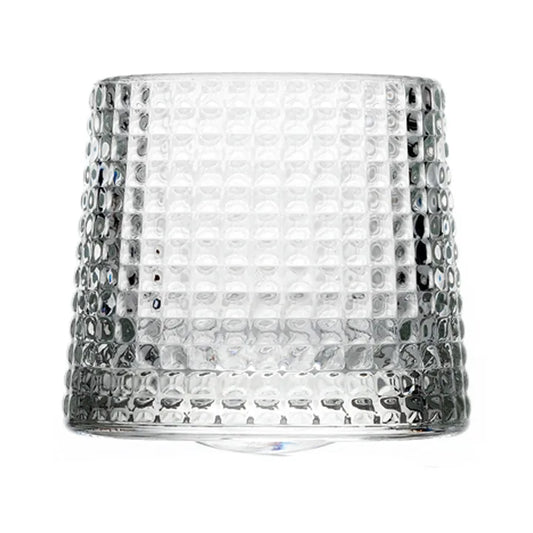 Clear glass Blossom whisky tumbler with textured pattern on a white background