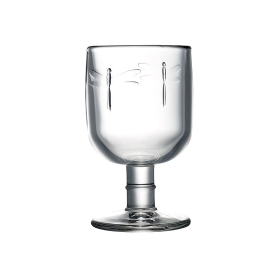 Clear glass La Rochere dragonfly wine goblet with engraved design on a white background