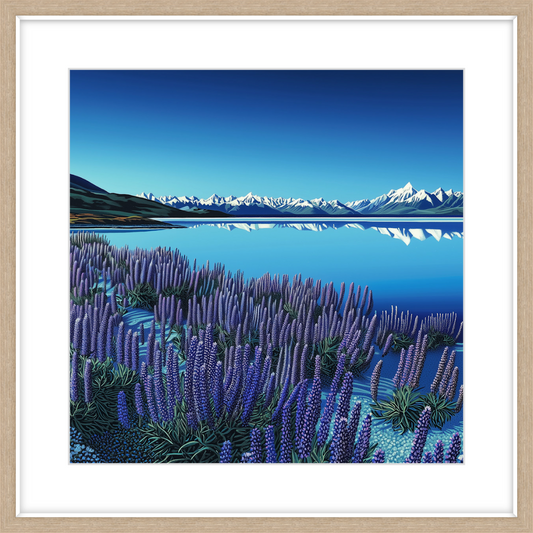 Framed artwork of a landscape with lupin flowers, a lake, and mountains.