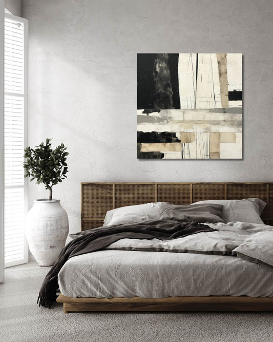 Modern bedroom with a bed, abstract painting on the wall, and a plant.