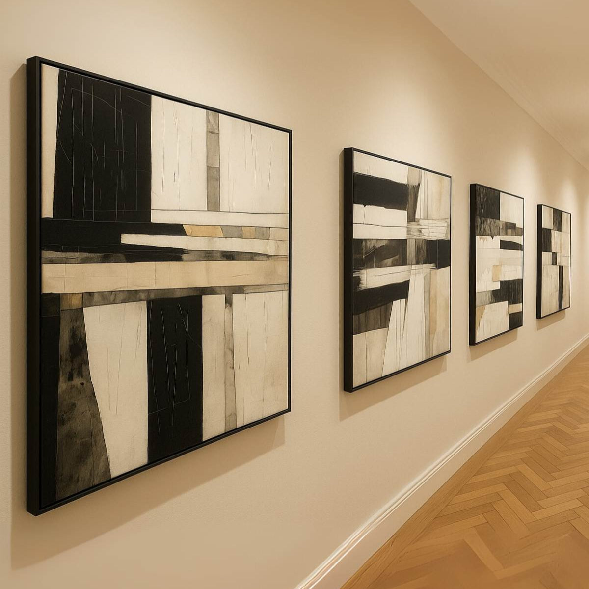 Row of abstract art pieces on a wall in an indoor setting