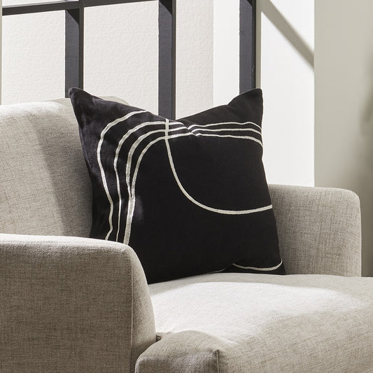 Black Loveline cushion with white embroidered sweeping lines