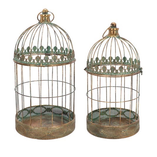 Two decorative bird cages with intricate designs on a white background