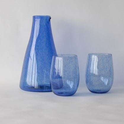 royal blue glass carafe and two matching glasses