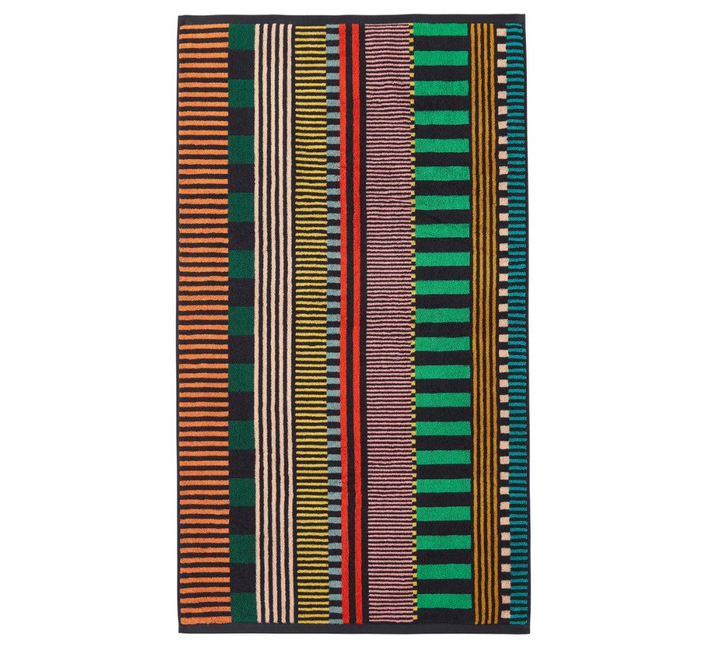 Colorful striped towel with vertical lines on a white background