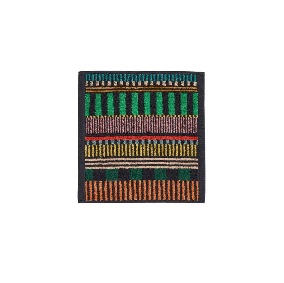 Multicolored striped face cloth on a white background