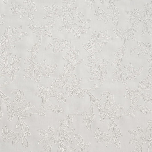 white embroidered drapery fabric wthi leaf pattern