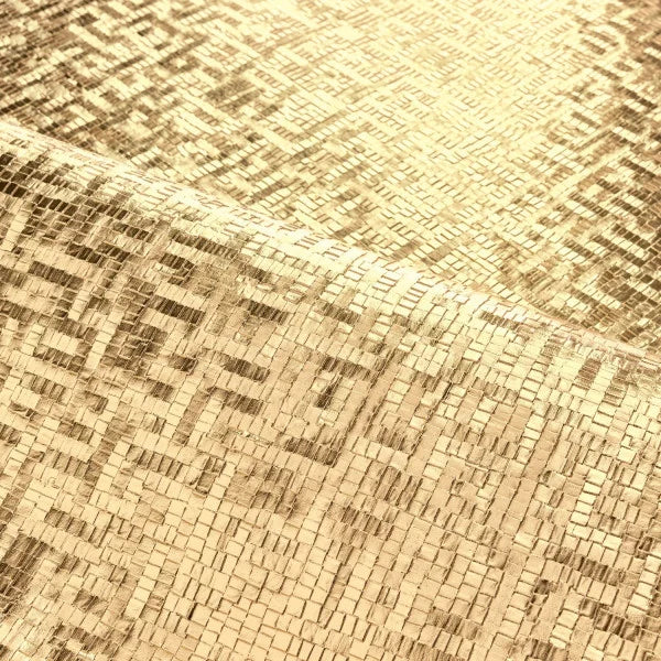 Close-up of a woven gold wallpaper