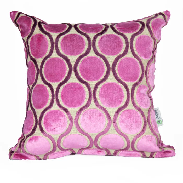 Decorative pillow with pink and purple pattern on a beige background