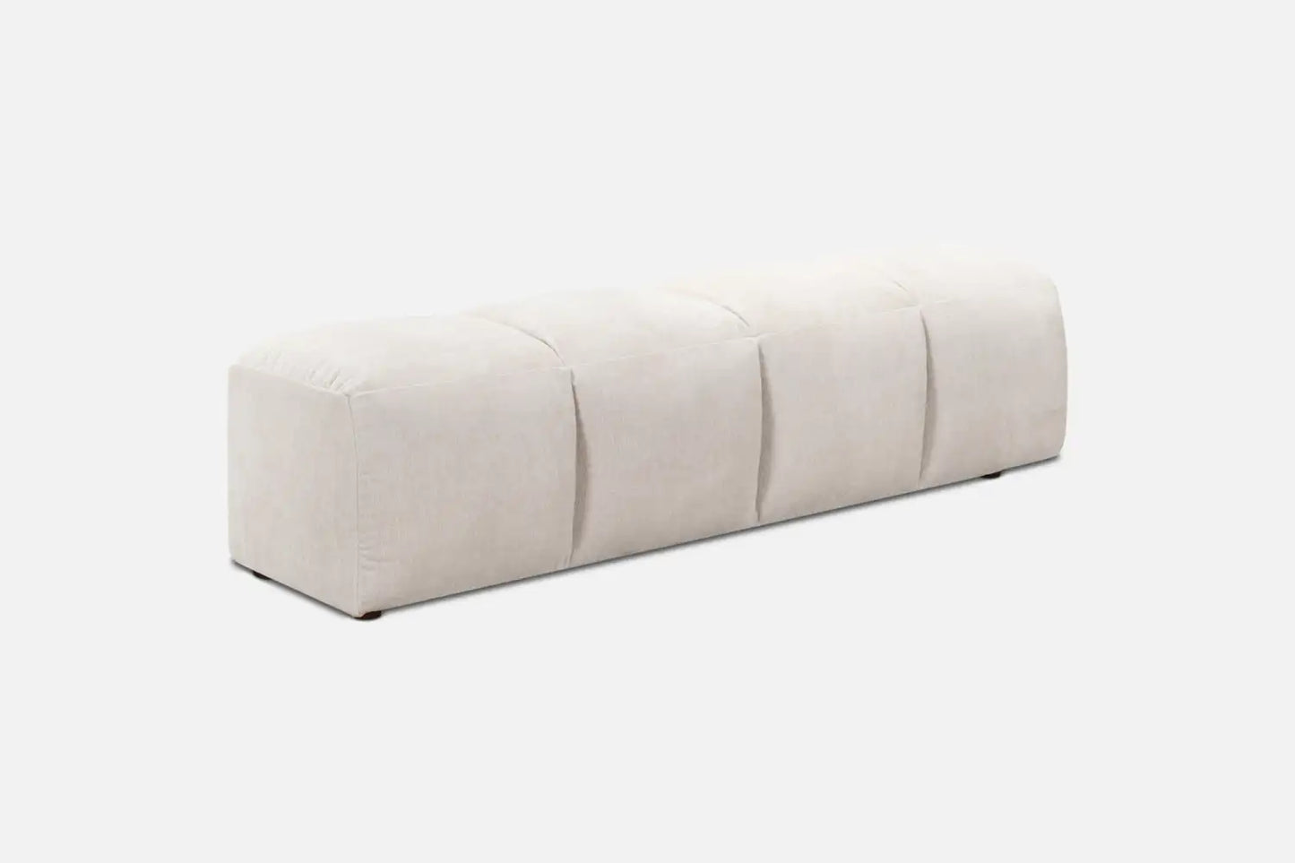 Cream fabric ottoman/bench in 4 padded stitched sections