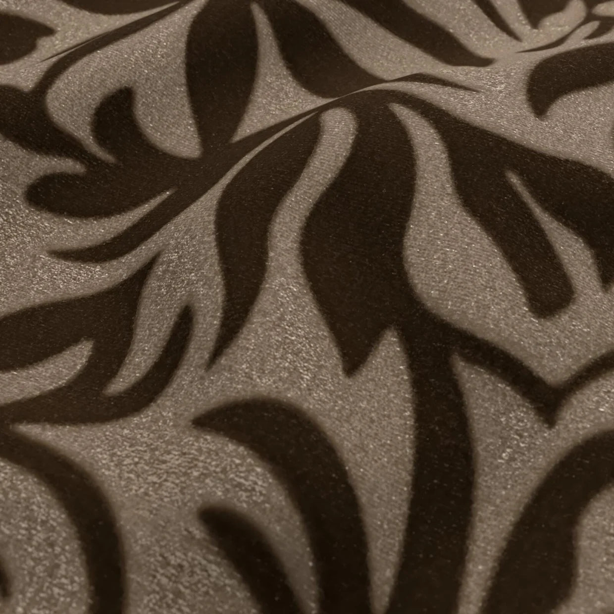 Close-up of a textured brown surface with leaf-like patterns
