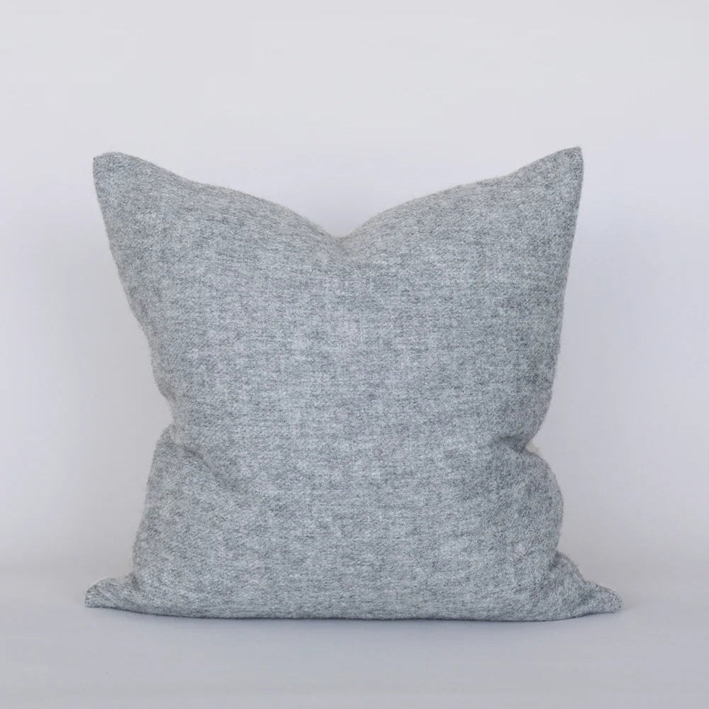 Gray textured pillow on a white background