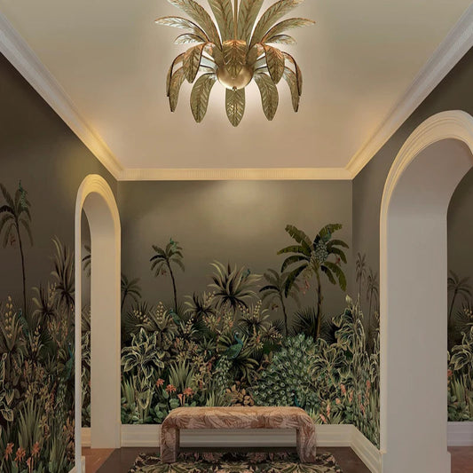 Decorative interior with palm tree chandelier and wall mural