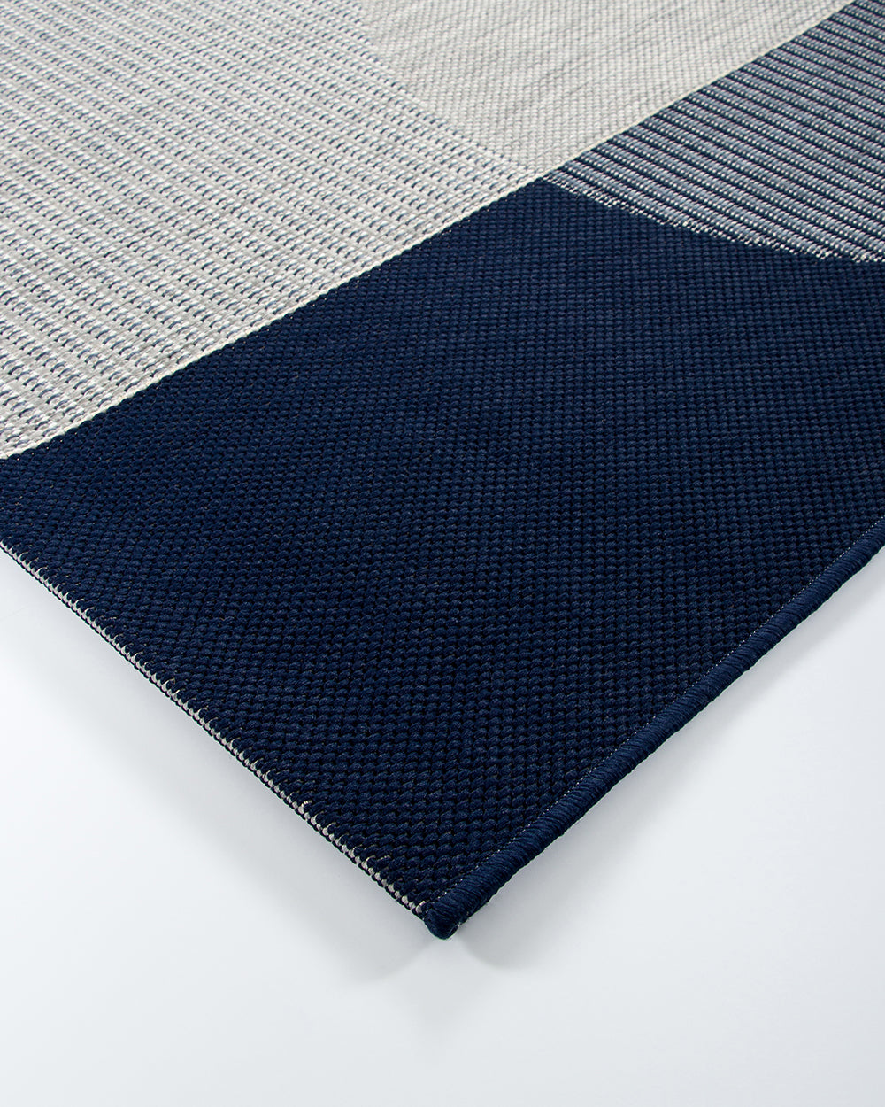 Textured fabric with a patterned design on a white background
