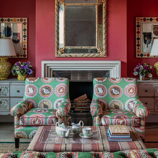 Robina's dinner party fabric in bright colours and patterns in a loungeroom setting from GP&J Baker