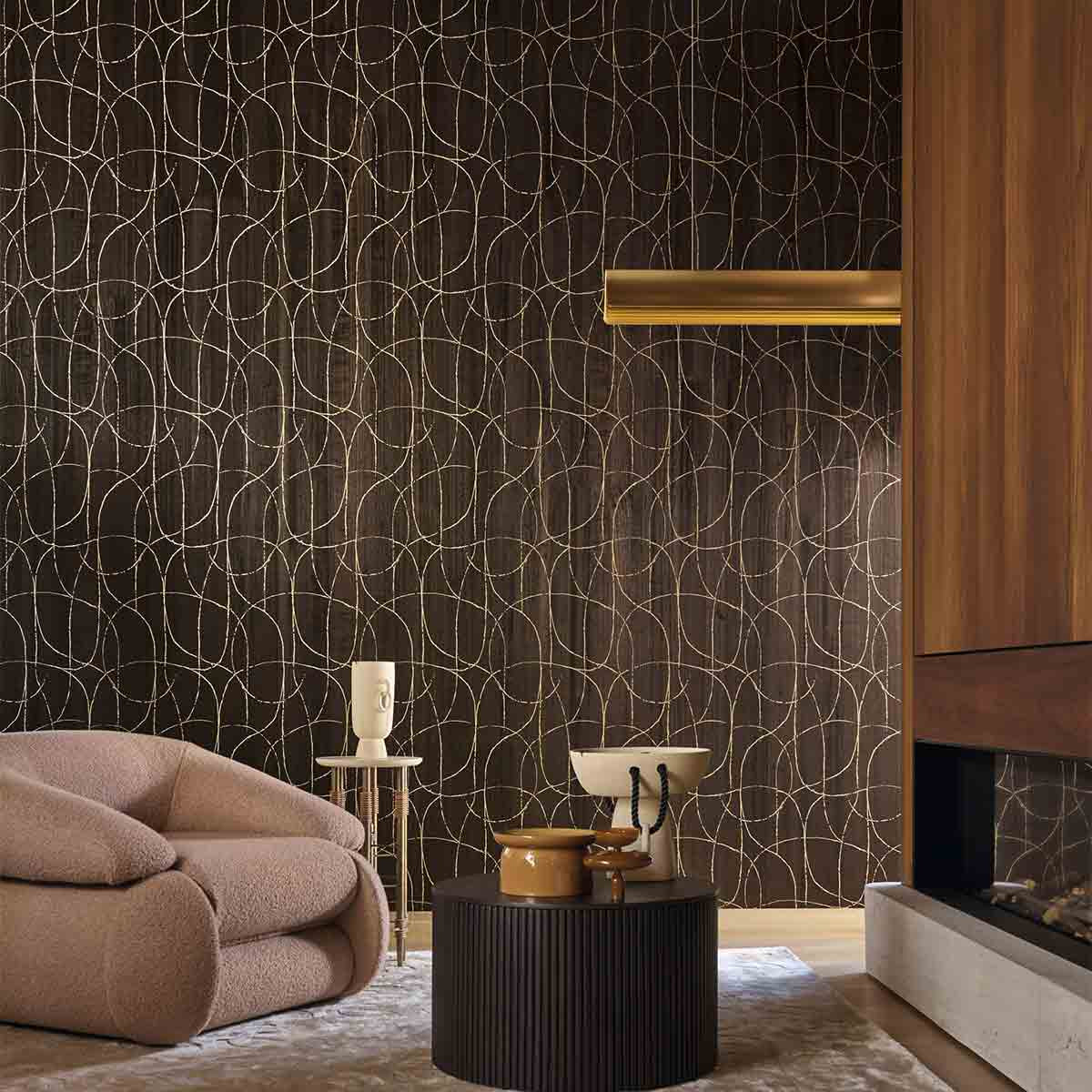 Modern living room with brown textured wallpaper, beige sofa, and decorative items.