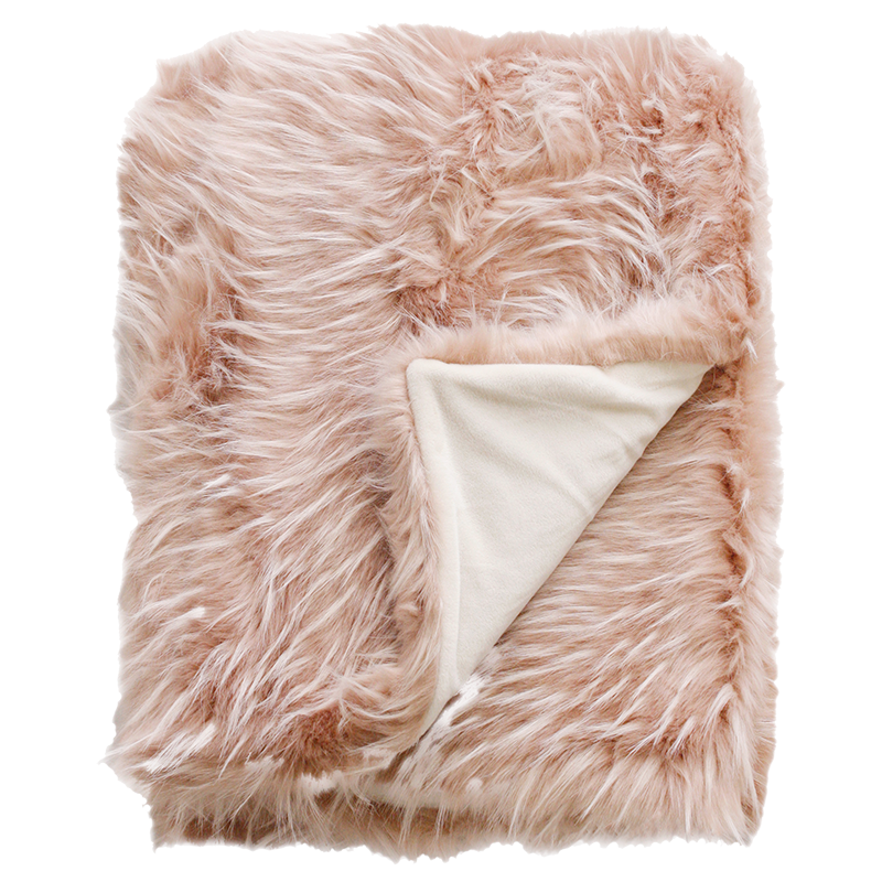 Luxury faux fur throw Peony Plume in pale pink from Heirloom. These are the best fake fur throws, super soft for NZ interior design