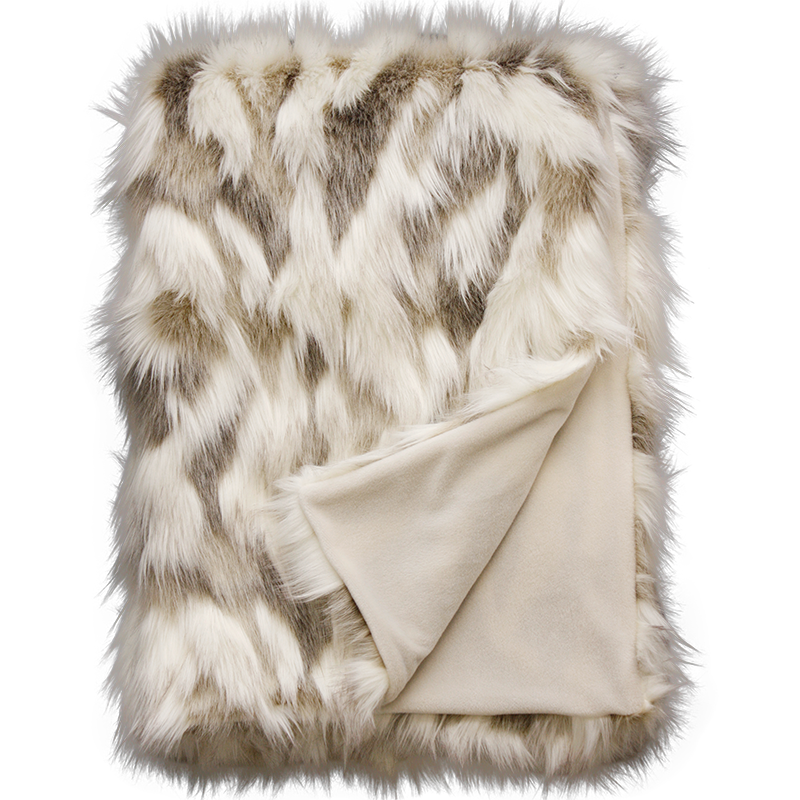 Luxury faux fur throw in cream and brown from Heirloom.  These are the best fake fur throws, super soft for NZ interior design. Snowhare.