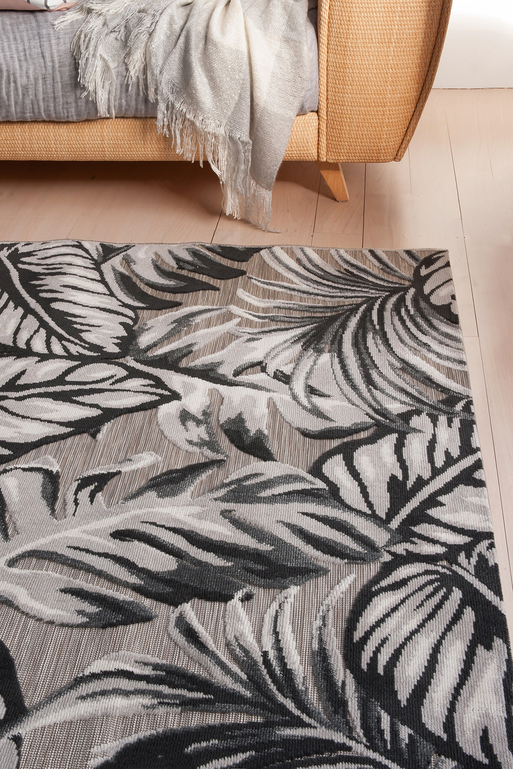 Figuig rug on floor by sofa