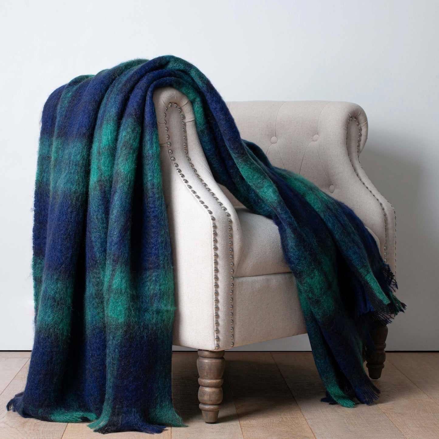 Soft Mohair luxury throws from Glamorous Goat. Mohair throw in Treble Cone green and blue check available at My Sanctuary