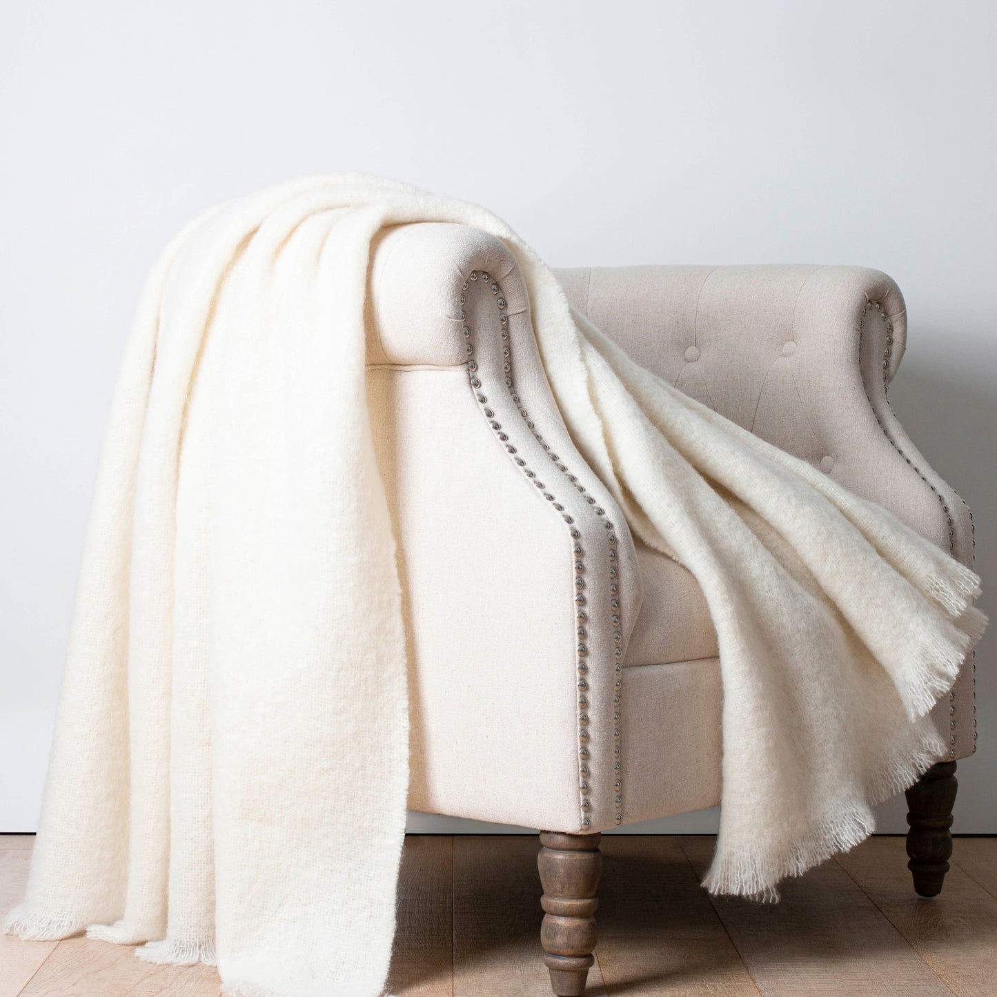 Soft Mohair luxury throws from Glamorous Goat. Mohair throw in Ivory white available at My Sanctuary