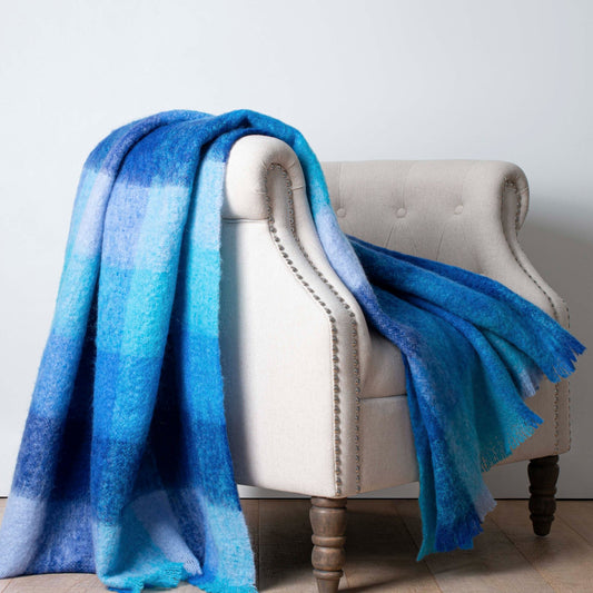 Soft Mohair luxury throws from Glamorous Goat. Mohair throw in Roy's Blue available at My Sanctuary