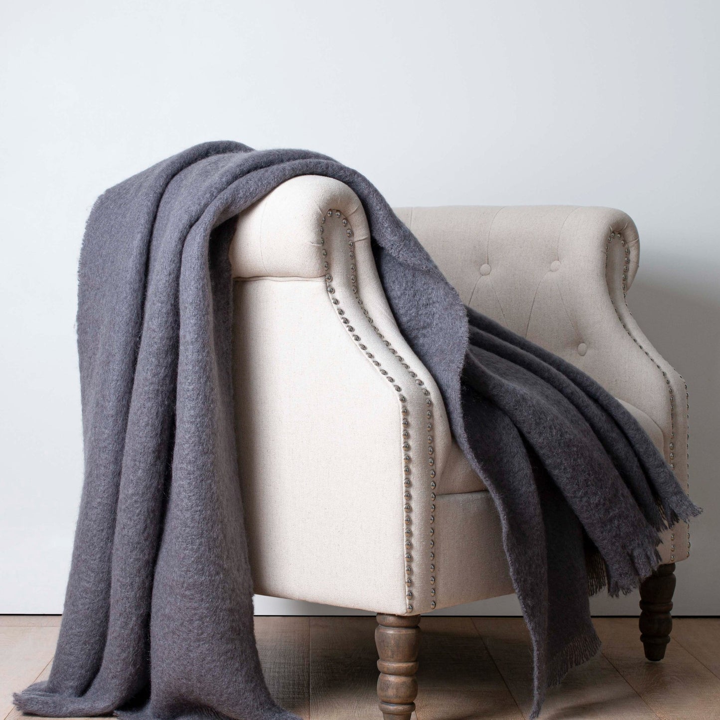 Soft Mohair luxury throws from Glamorous Goat. Mohair throw in Charcoal available at My Sanctuary