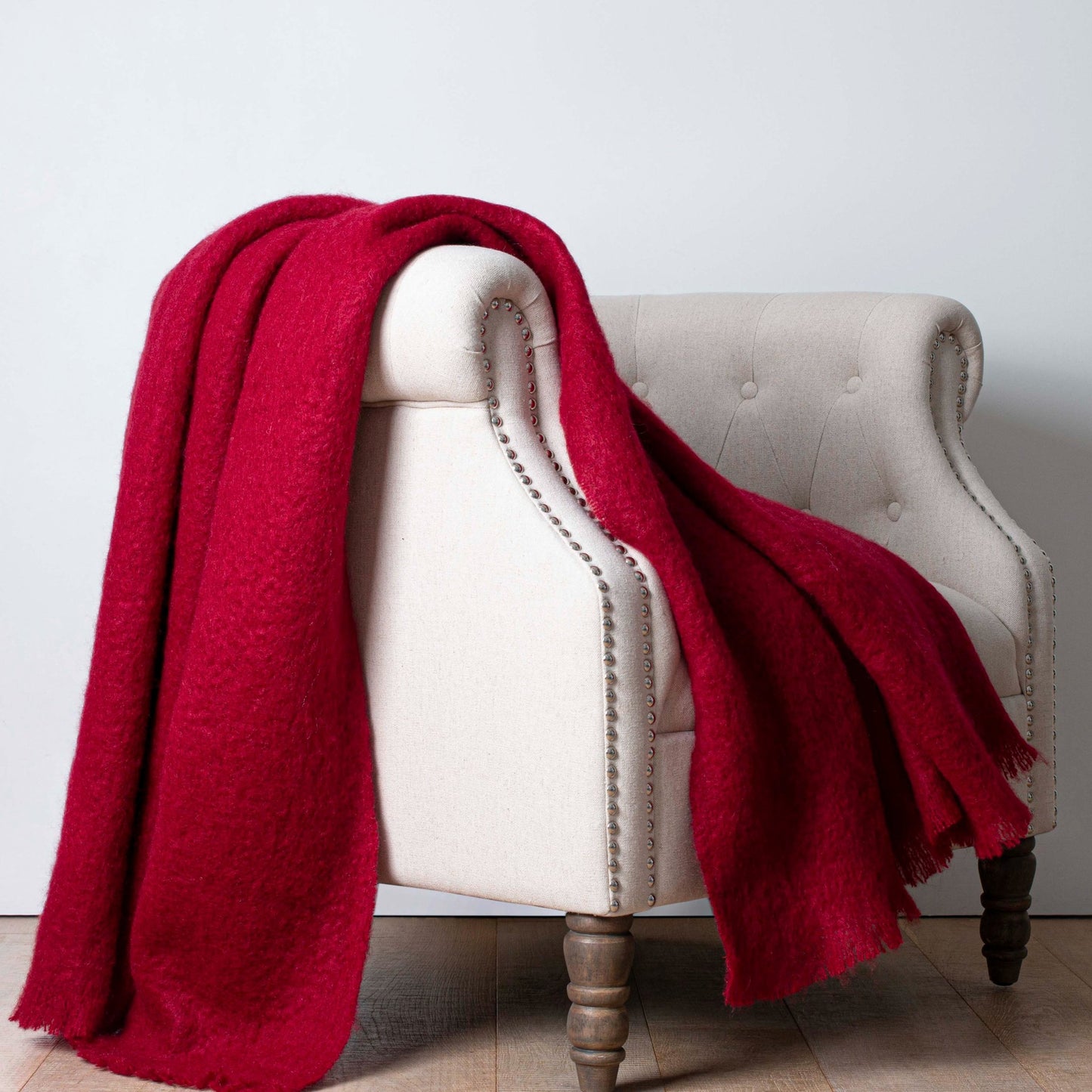 Soft Mohair luxury throws from Glamorous Goat in Pinot Noir red. Angora kid mohair throws available at My Sanctuary