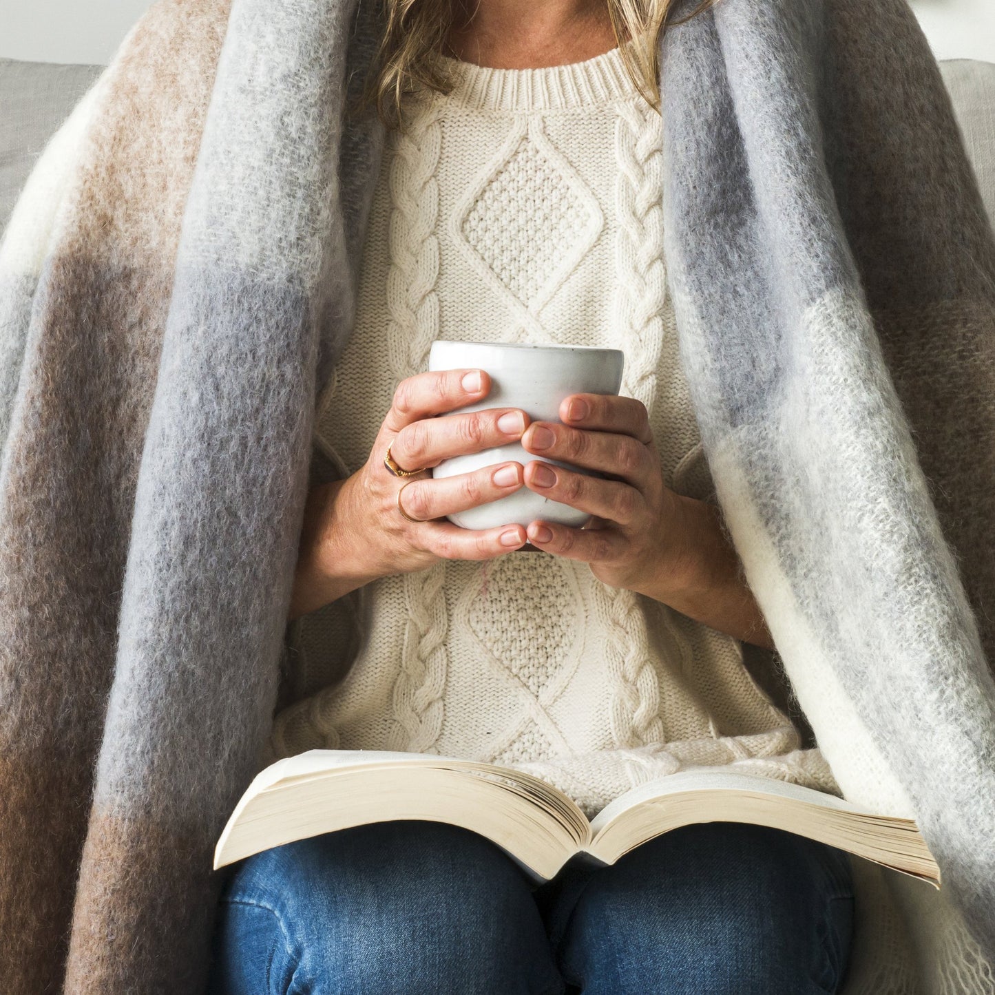 Soft Mohair luxury throws from Glamorous Goat. Mohair throw in Pembroke brown and grey check available at My Sanctuary