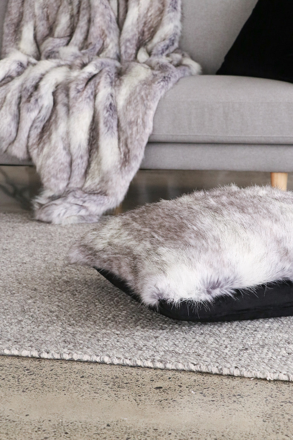Imitation faux fur cushion in Grey Coyote.