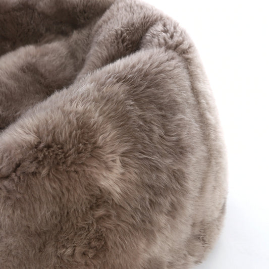New Zealand long wool sheepskin bean bag in Vole close up