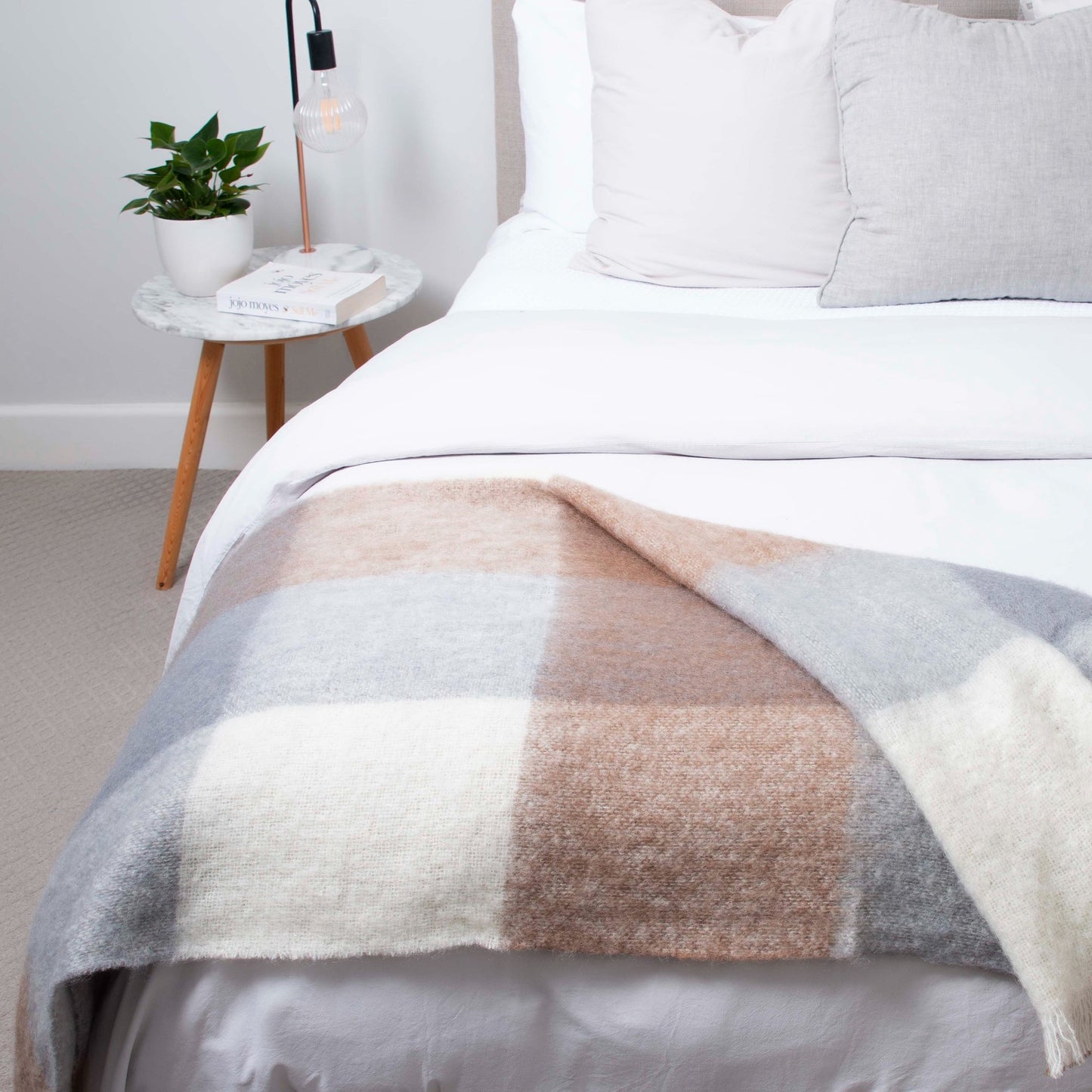 Soft Mohair luxury throws from Glamorous Goat. Mohair throw in Pembroke brown and grey check available at My Sanctuary